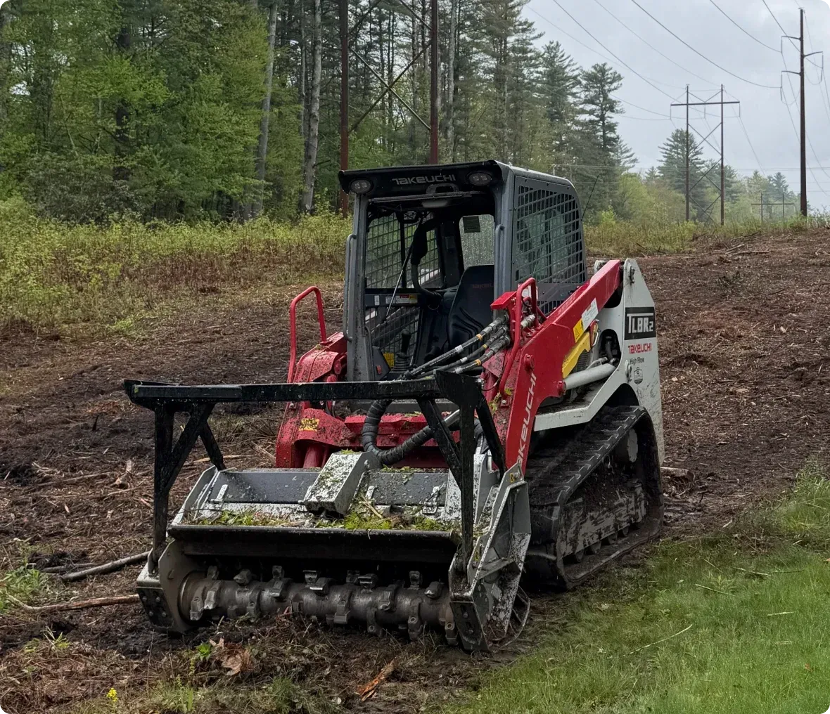 Forestry mulcher on a cleared strip under power lines
