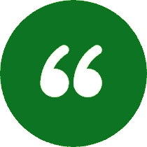 Green circle with white quotation marks